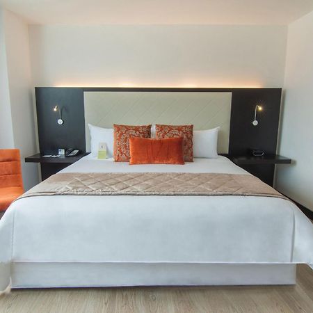 โฟร์พอยต์ บาย เชอราตัน เกวนกา Hotel กูเอ็งกา ภายนอก รูปภาพ A bedroom at the hotel