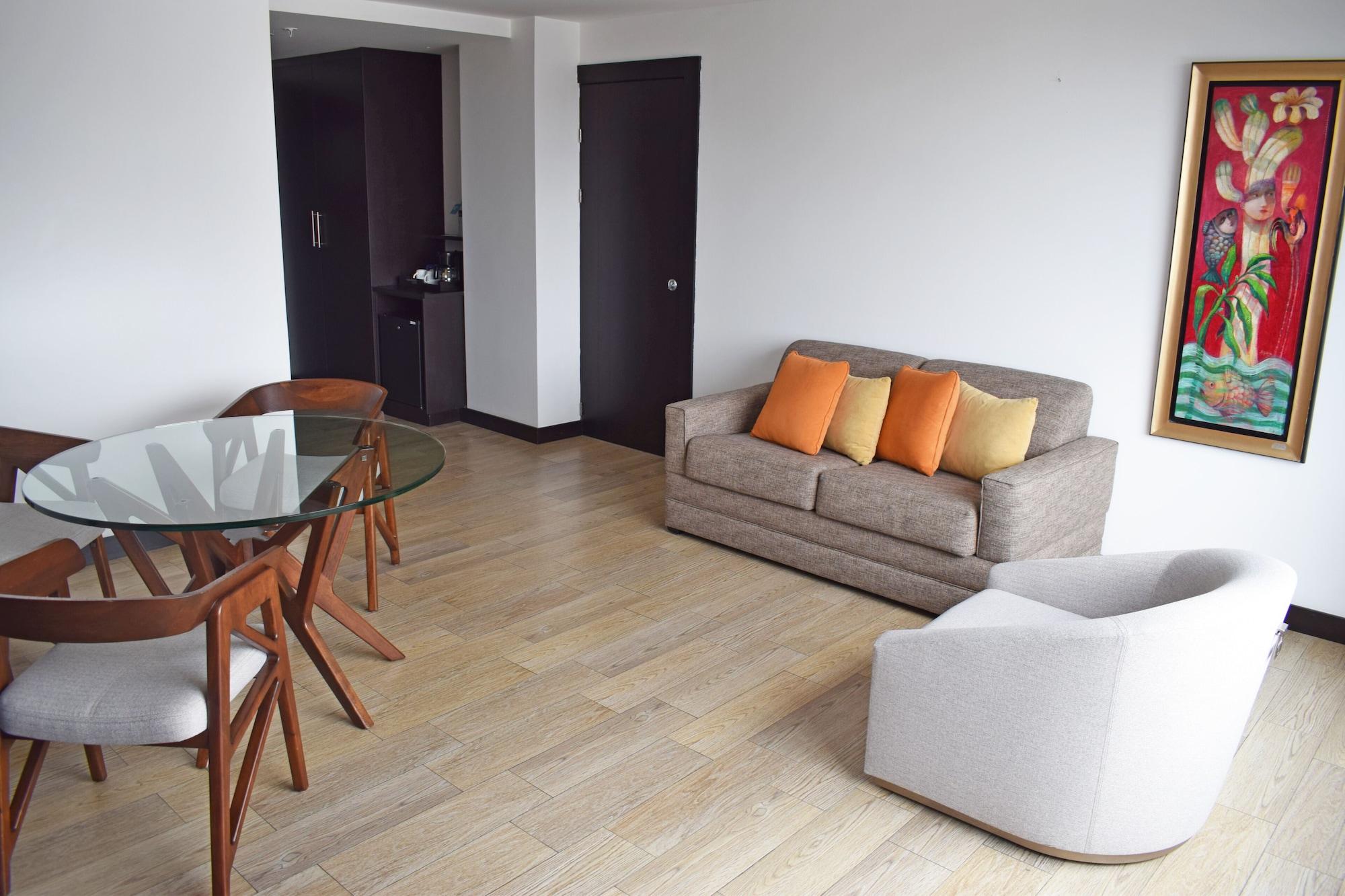 โฟร์พอยต์ บาย เชอราตัน เกวนกา Hotel กูเอ็งกา ภายนอก รูปภาพ A living room