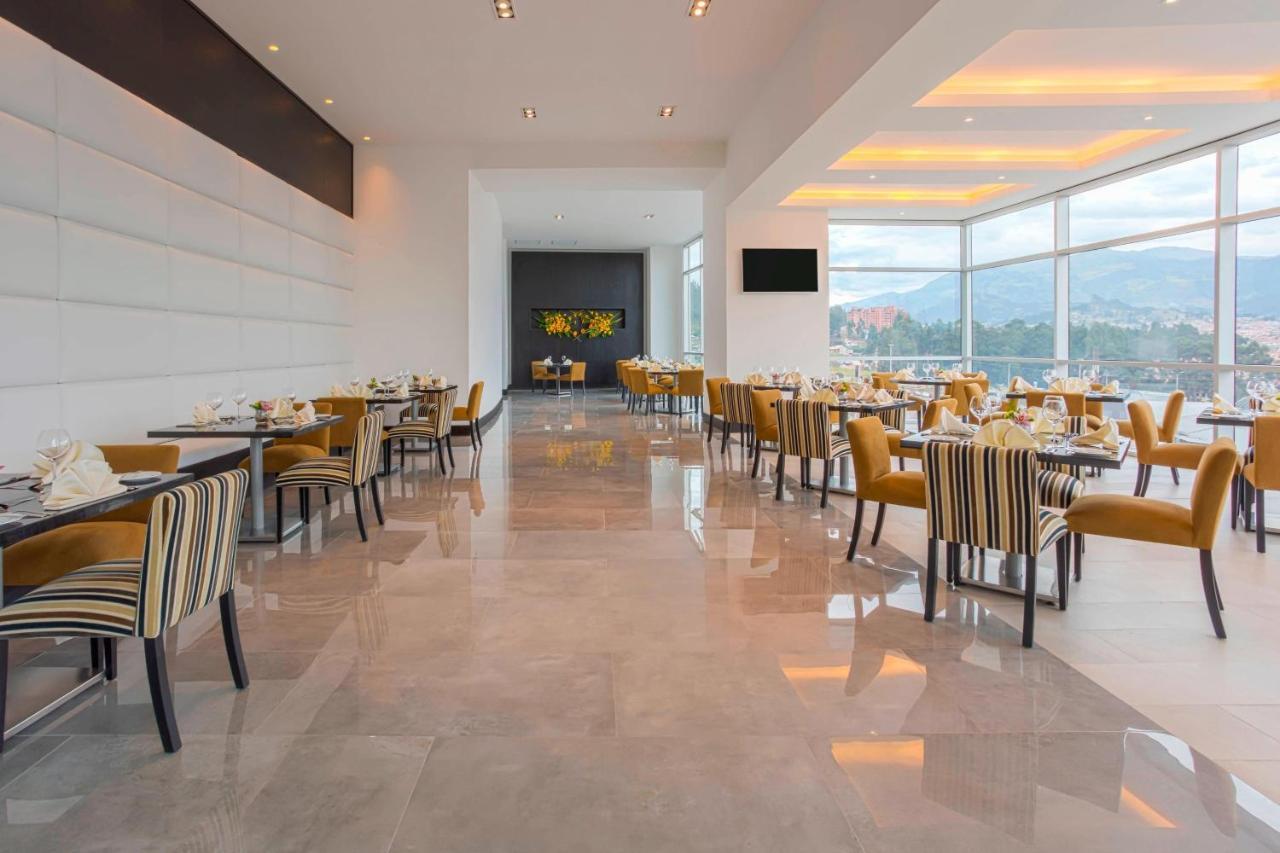 โฟร์พอยต์ บาย เชอราตัน เกวนกา Hotel กูเอ็งกา ภายนอก รูปภาพ The lounge at the airport.