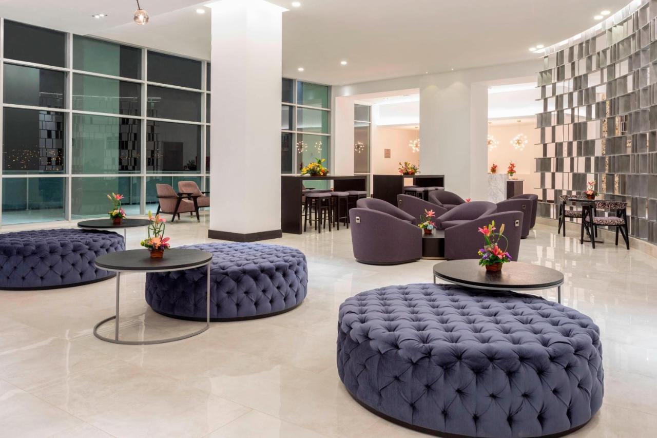 โฟร์พอยต์ บาย เชอราตัน เกวนกา Hotel กูเอ็งกา ภายนอก รูปภาพ Lobby