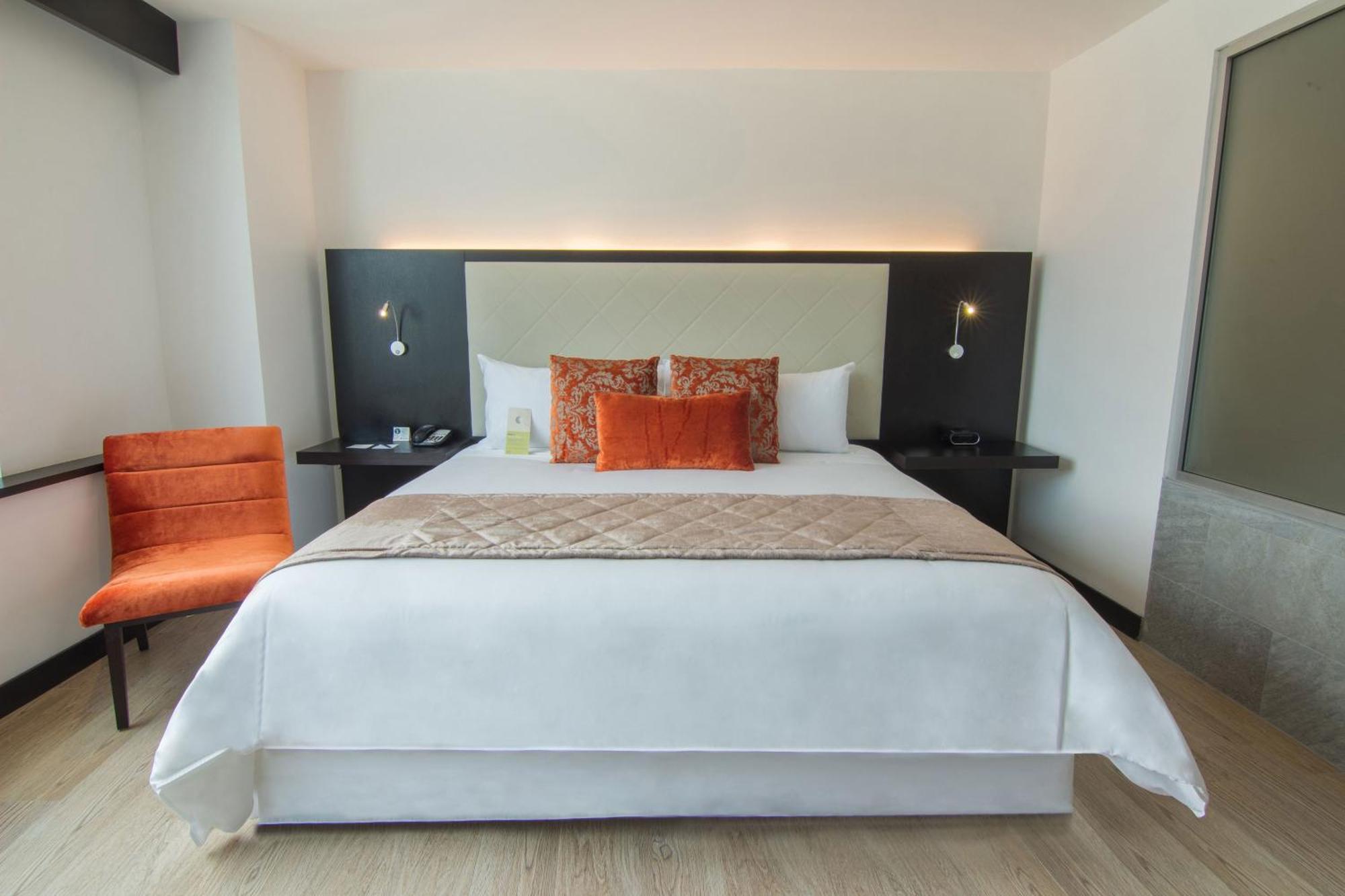 โฟร์พอยต์ บาย เชอราตัน เกวนกา Hotel กูเอ็งกา ภายนอก รูปภาพ A bedroom at the hotel