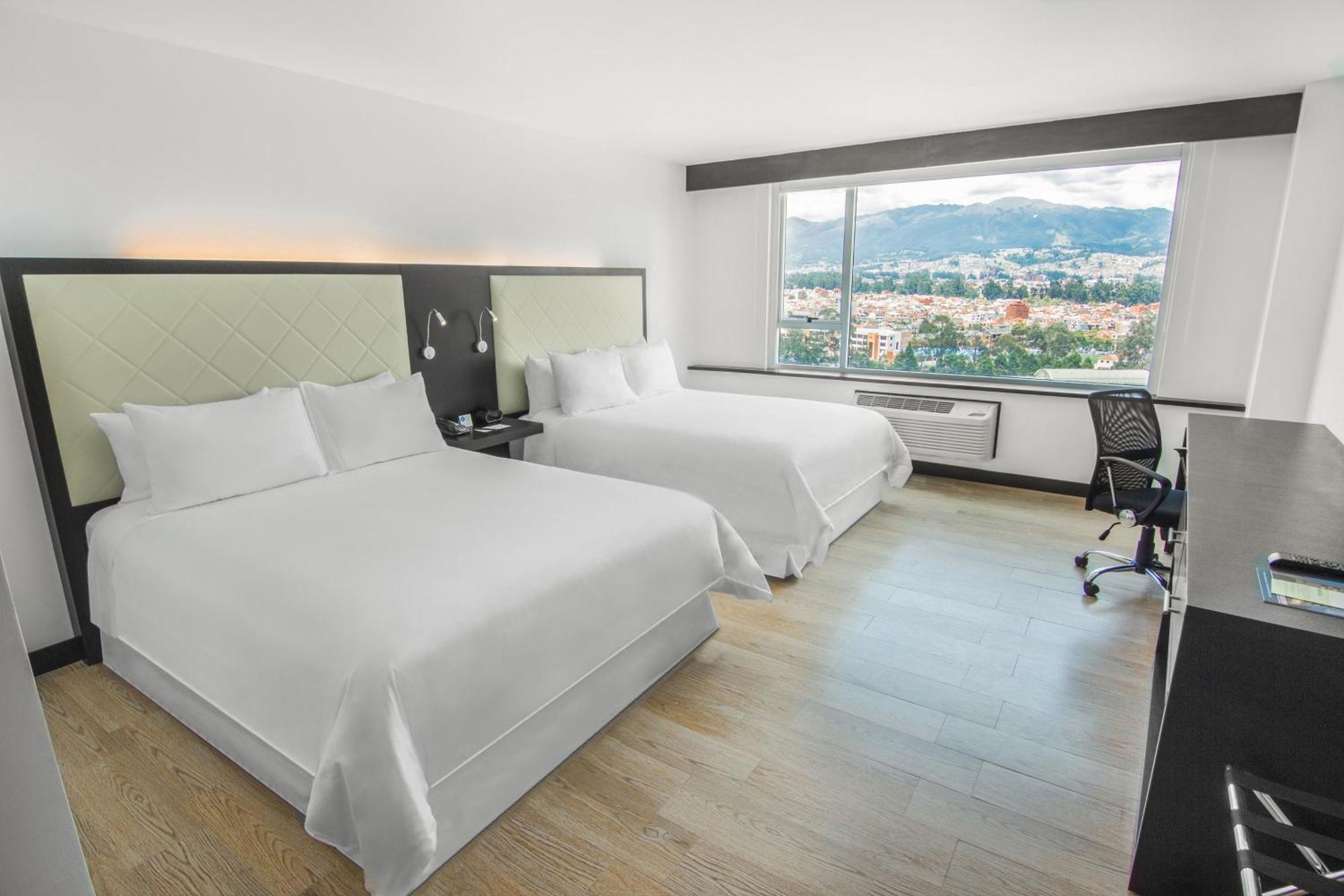 โฟร์พอยต์ บาย เชอราตัน เกวนกา Hotel กูเอ็งกา ภายนอก รูปภาพ Deluxe room