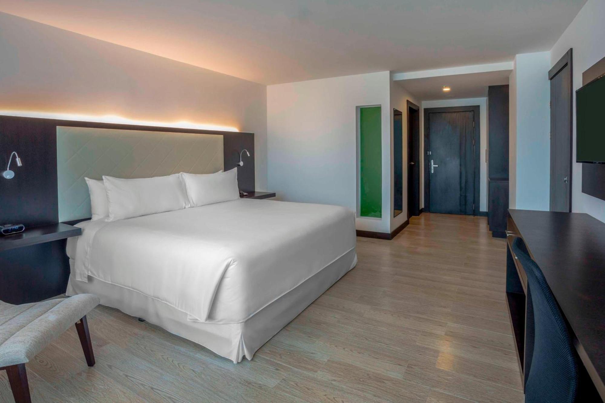โฟร์พอยต์ บาย เชอราตัน เกวนกา Hotel กูเอ็งกา ภายนอก รูปภาพ A room at the hotel