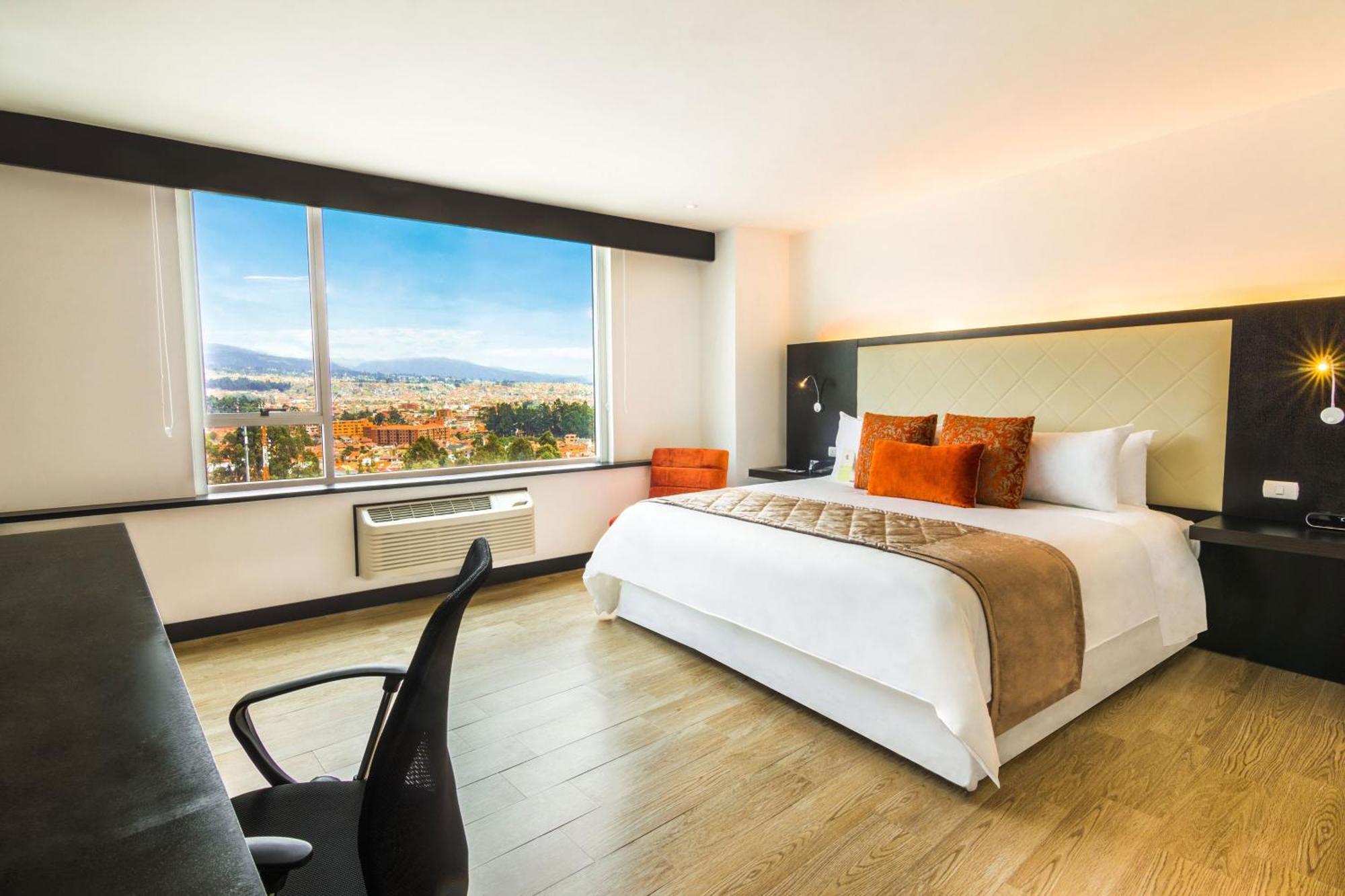 โฟร์พอยต์ บาย เชอราตัน เกวนกา Hotel กูเอ็งกา ภายนอก รูปภาพ Executive Suite