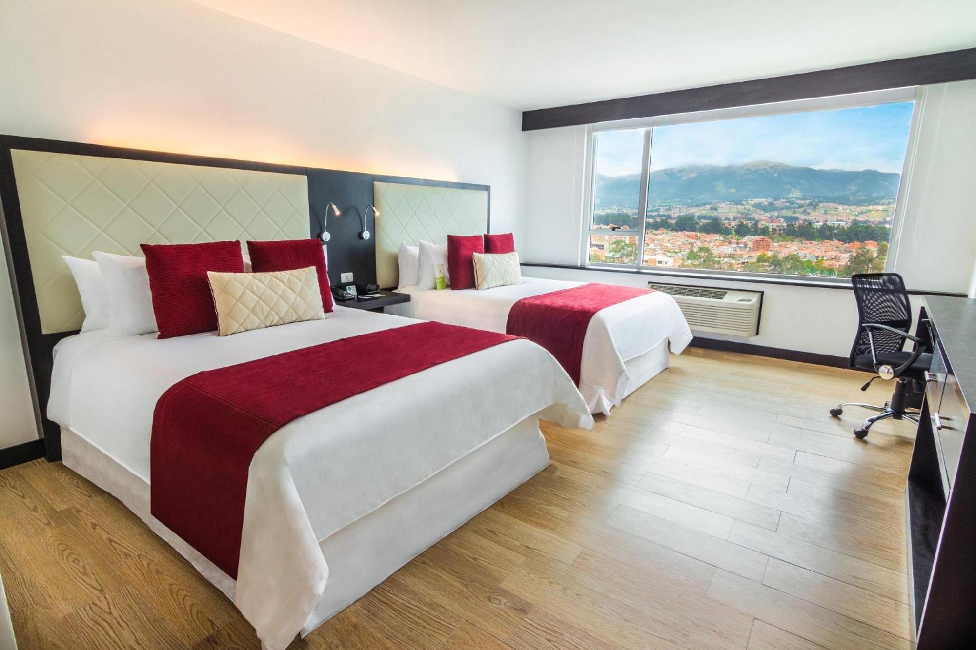 โฟร์พอยต์ บาย เชอราตัน เกวนกา Hotel กูเอ็งกา ภายนอก รูปภาพ Deluxe room